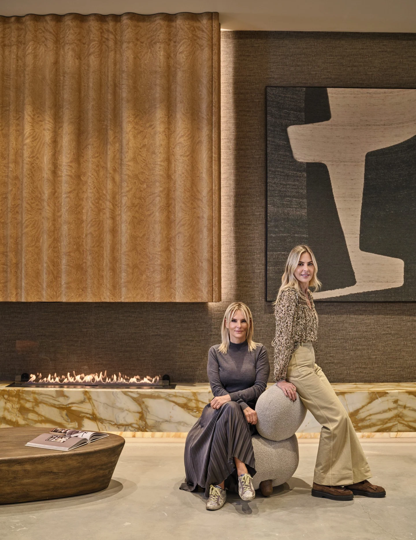 Two members of four&more by the fireplace in the Beykoz showroom